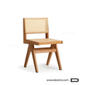 Chaise de table Otino sans accoudoirs en bois massif noyer et rotin au Maroc.