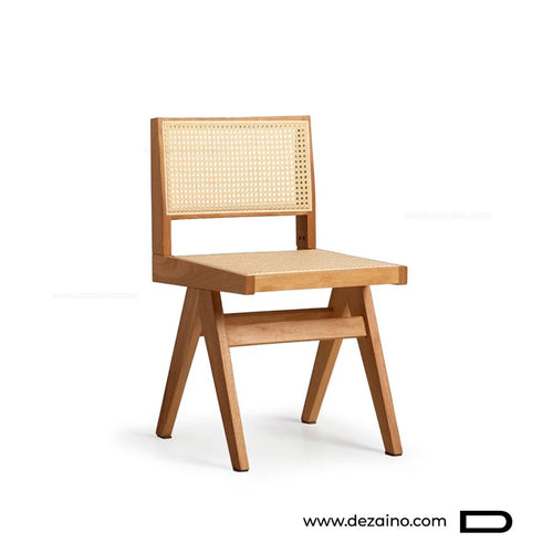 Chaise de table Otino sans accoudoirs en bois massif noyer et rotin au Maroc.