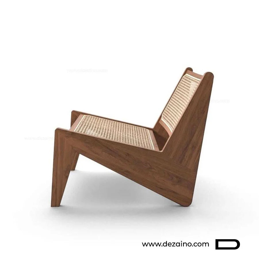 Fauteuil Otino associant pieds compas sculpturaux et dossier en cannage clair.